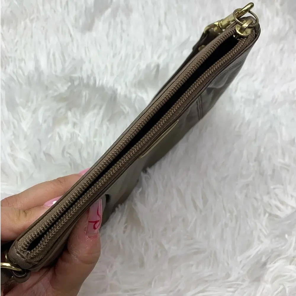 Coach bronze wristlet